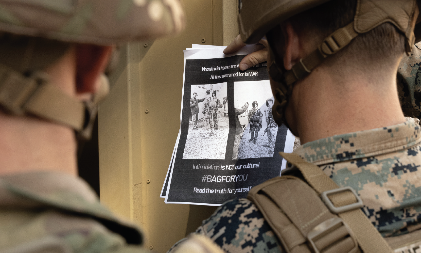 Servicemembers assess simulated propaganda at Marine Corps Base Quantico, Virginia, November 5, 2024, as part of information maneuverexercise hosted by Marine Corps Information Operations Center (U.S. Marine Corps/Joshua Bustamante)